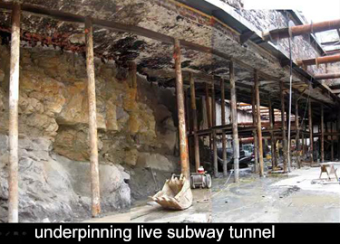 the existing subway tunnel is being supported on drilled-in piles.